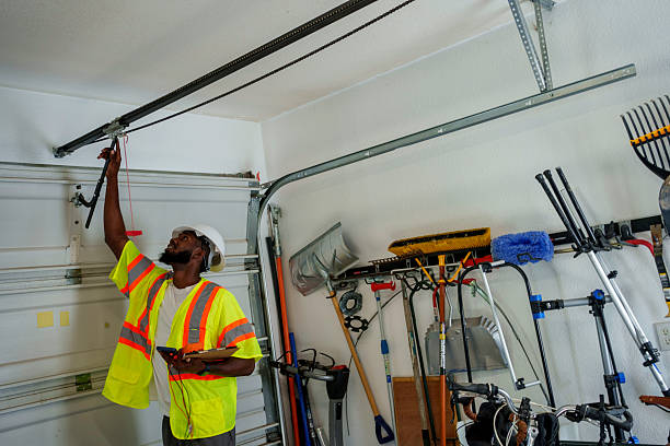 Professional Garage Door Installation technician working in Lake Park, IA